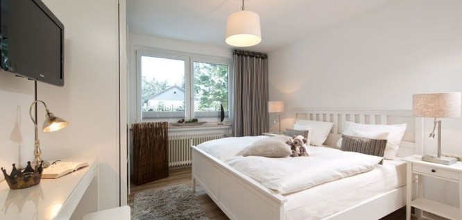 Das Schlafzimmer im Genießer-Appartement des Wellness Resort Romantischer Winkel im Harz, Bad Sachsa