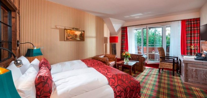 Ihr Schlafzimmer am Schlossteich im Wellnesszimmer Deluxe - Wellnesshotel Seeschlößchen | Privat-SPA & Naturresort – Niederlausitz/Brandenburg