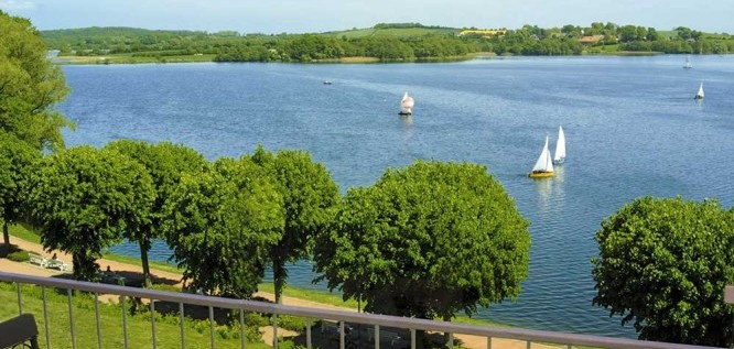 View from Vitalia Seehotel to the Segeberger See with sailing- boats- Bad Segeberg - Holstein Switzerland Region