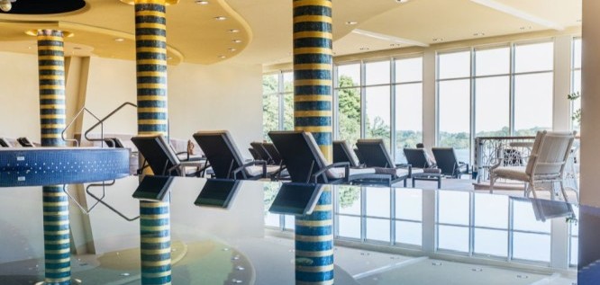 Indoor pool with relaxation area at Vitalia Seehotel - Bad Segeberg - Schleswig-Holstein